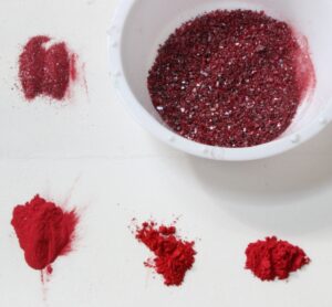 Cinnabar pigment with different particle sizes from dark red to orange-red.