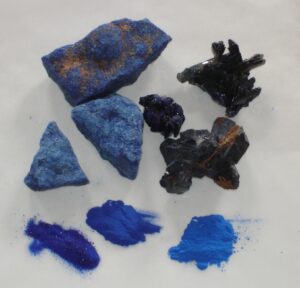 Azurite rocks, crystals and prepared pigment.